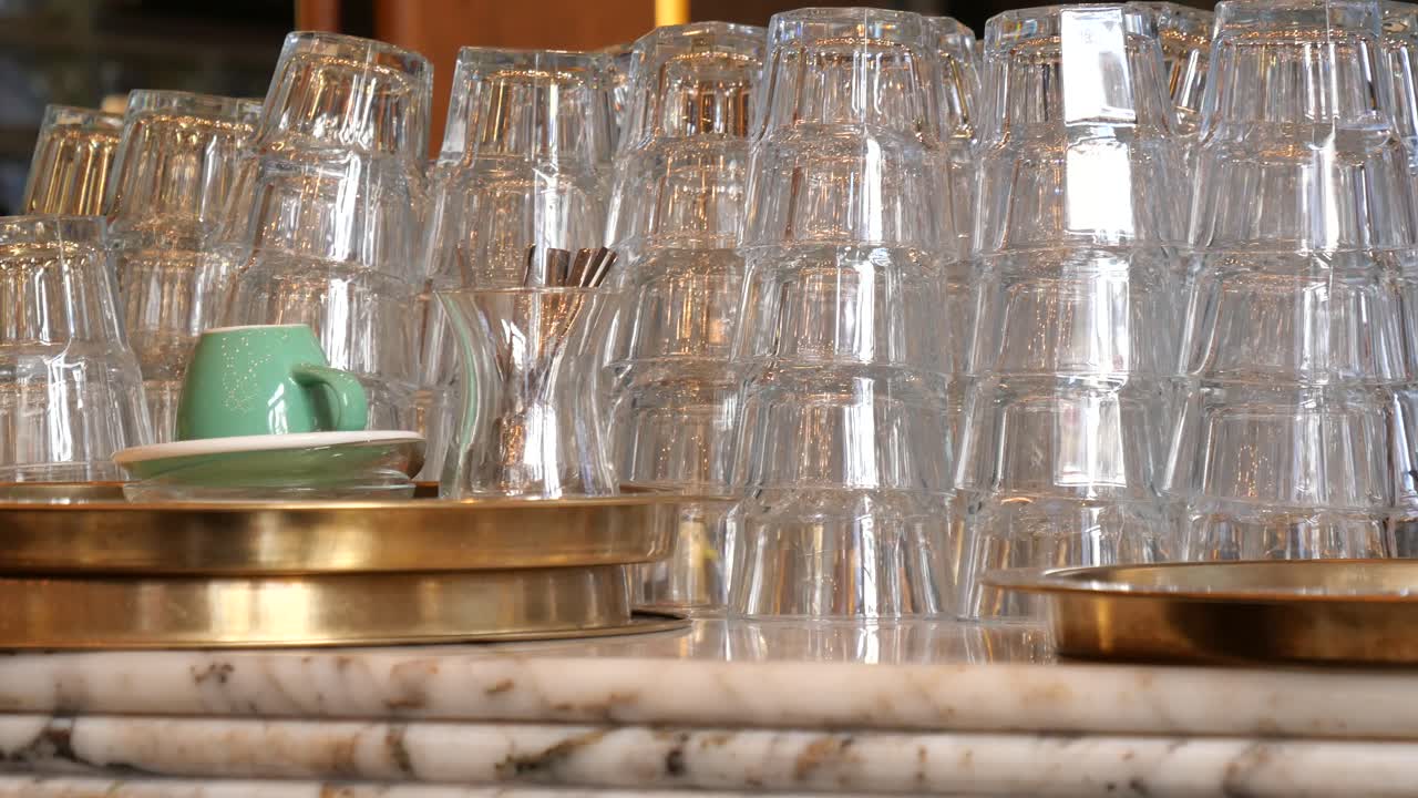 Stacked Glasses on a Bar Counter