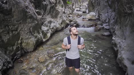 young mesmerized in the rocky canyon.