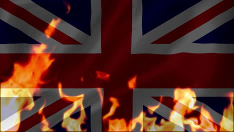 fire burning the union-jack flag of united kingdom