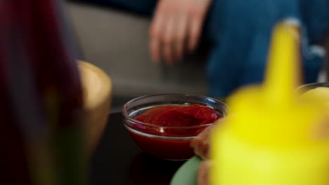 person eating food at home