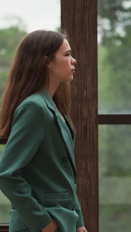 woman authority glides along windows in office. wave of frustration washes over woman as technical glitches derail critical presentation moments before begins