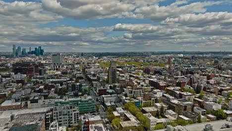 Drone-flight-over-american-neighborhood-in-New-York-City-during-cloudy-day-in-America