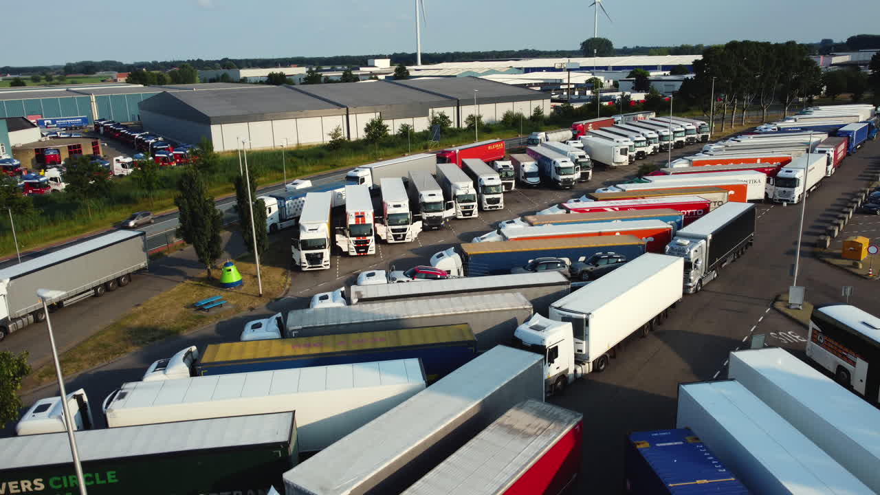 Trucks parked in a large parking lot