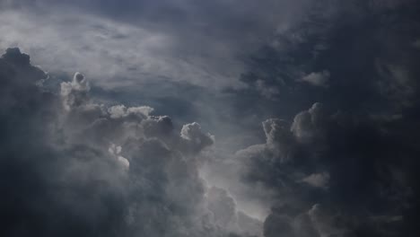 pov lightning flashes among thick cumulonimbus clouds in the sky, thunderstorm