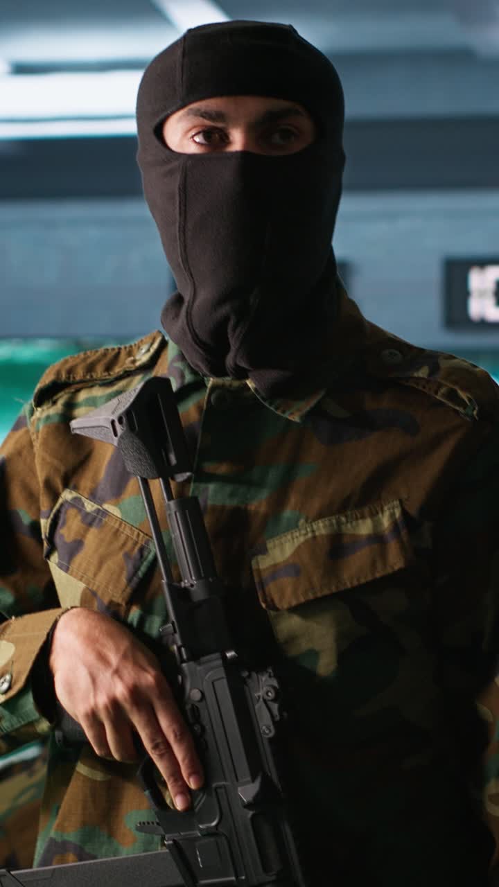 Vertical video Terrorist occupying enemy base of operations