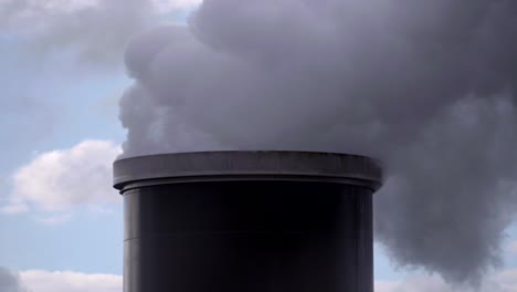 Close-up-view-of-smoke-from-an-industrial-chimney,-Chemical-plant-pumping-out-smoke-and-steam