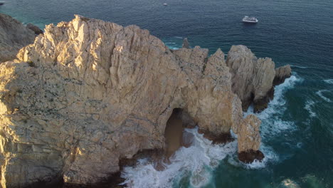 pirate cave, beach and sunset at famous cab san lucas cliffs