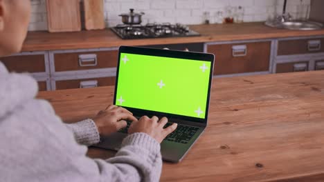 female using computer indoors