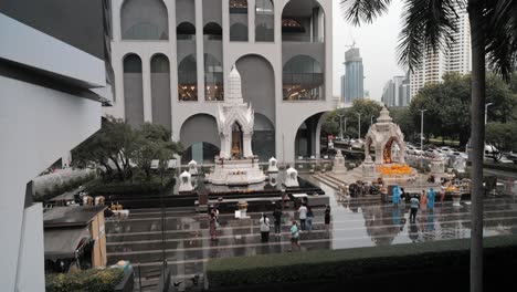 praying people in bangkok thailand