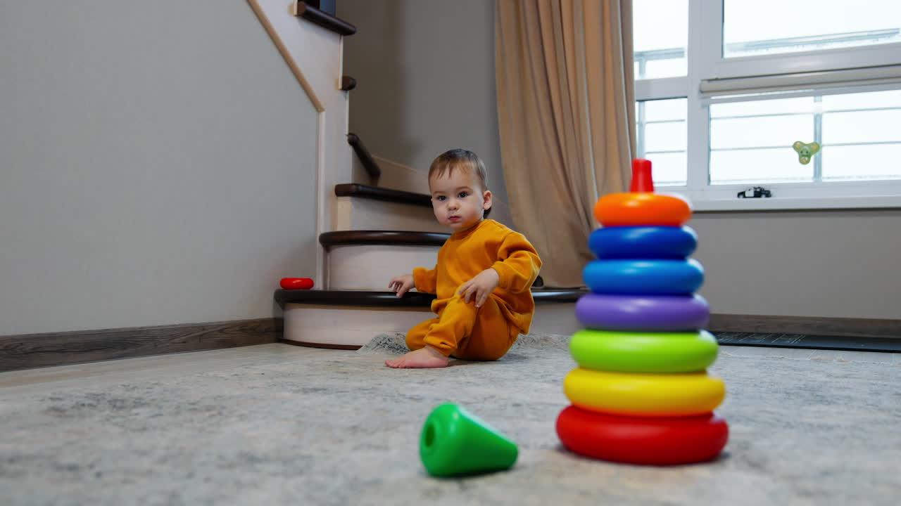 Baby playing with stacking rings