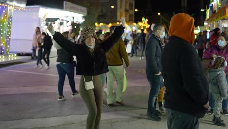 woman enjoying a night festival