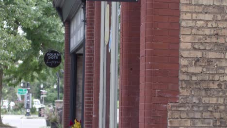 bad annie's store sign in lansing, m michigan old town district with video tilting down