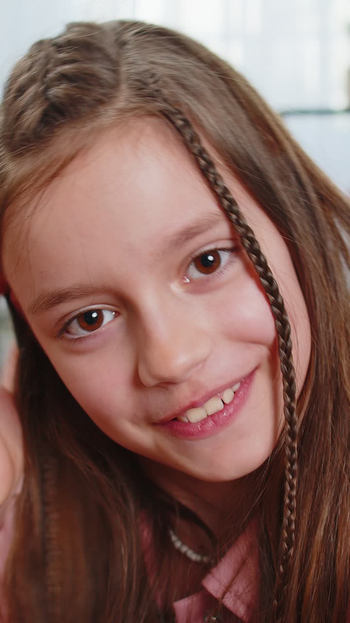 Pov of girl blogger taking selfie on smartphone video call online recording vlog stories at home