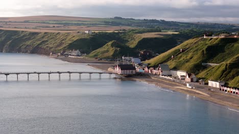 aerial drone view of saltburn-by-the-sea, saltburn pier and ocean in cleveland, north yorkshire in summer, early morning