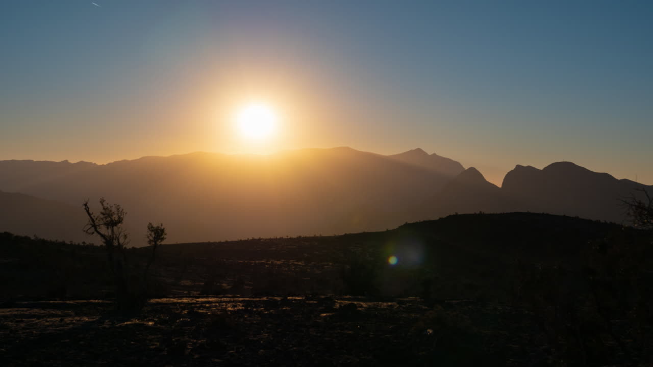 Timelapse do pôr do sol sobre Jebel Shams, Omã
