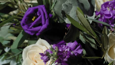 Gorgeous-floral-arrangement-bouquet-for-a-bride-with-purple-and-white-flowers