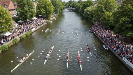 Exciting Rowing Race on Serene River with Spectators Gathered Along the Banks, Showcasing Athletes Competing in Energetic and Agile Motion