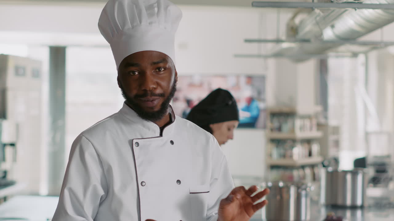 POV of african american chef filming cooking show with camera