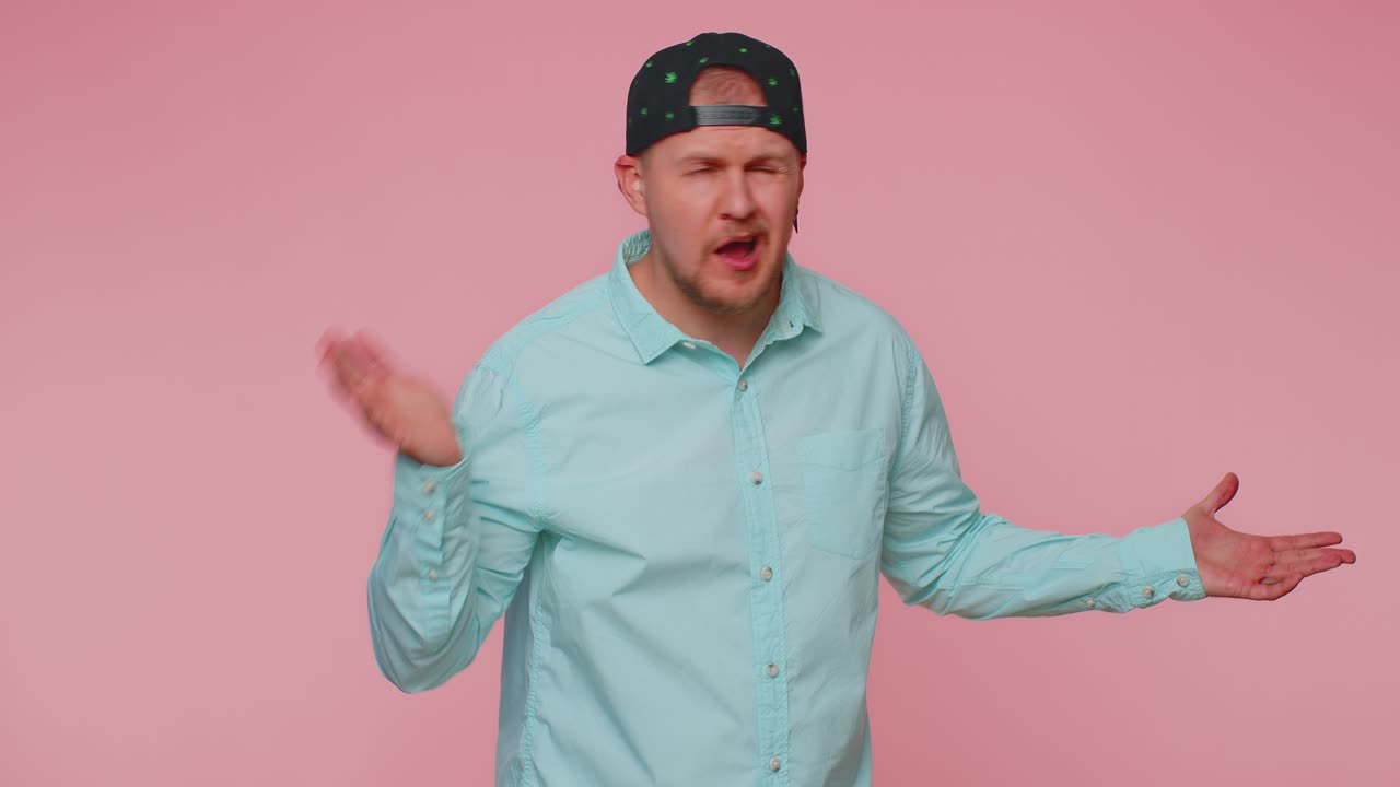 Man trying hear you looking confused and frowning keeping arm near ear for louder voice repeat