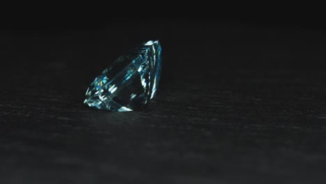 polished blue gemstone rotates and sparkles