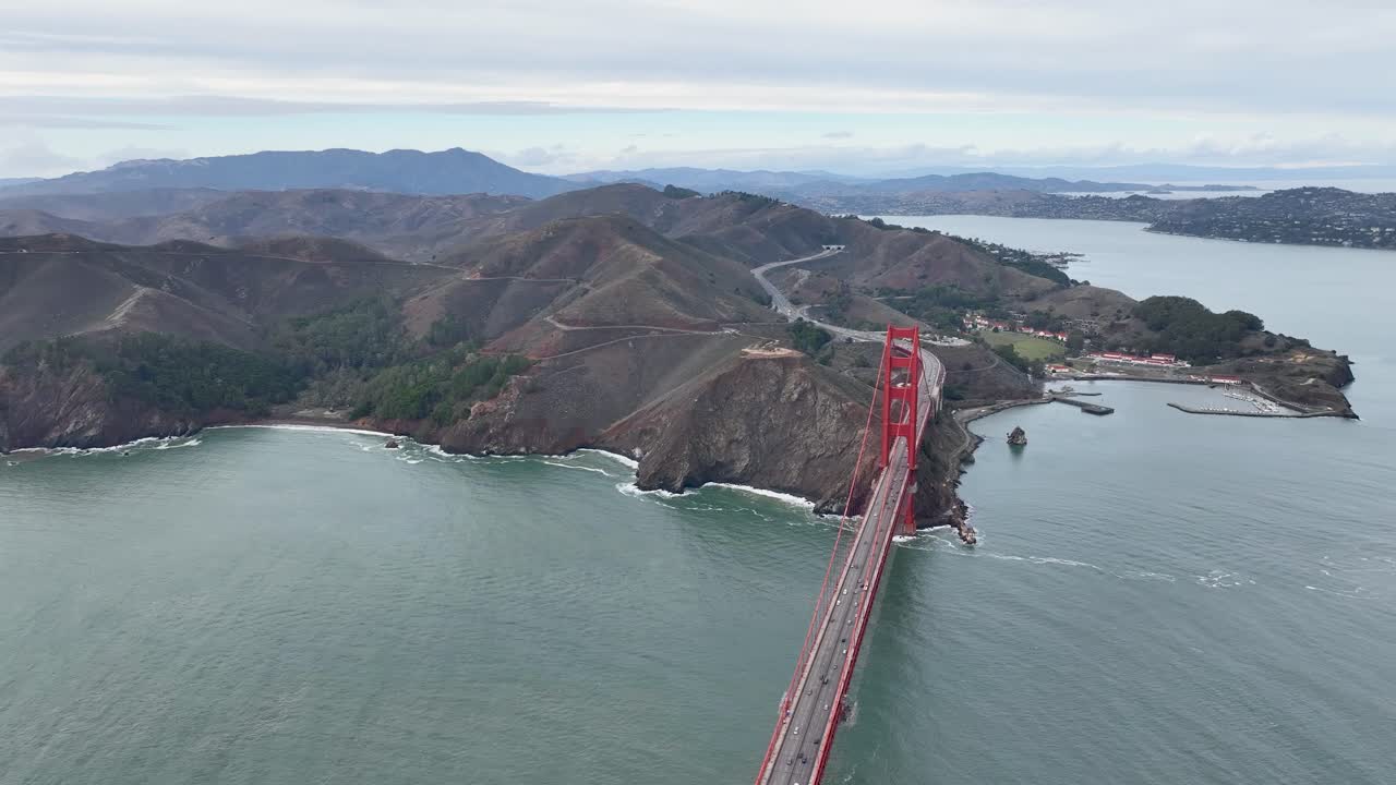 High angle view of Golden Gate Bridge with Marin Headlands on overcast day