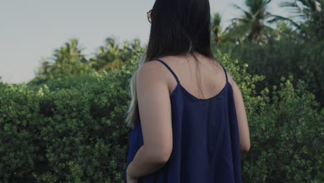 girl mesmerized by the view of the ocean