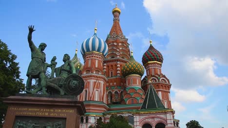 sliding camera, daytime, saint basil's cathedral appears in red square and monument to minin and pozharsky appears in summer in moscow