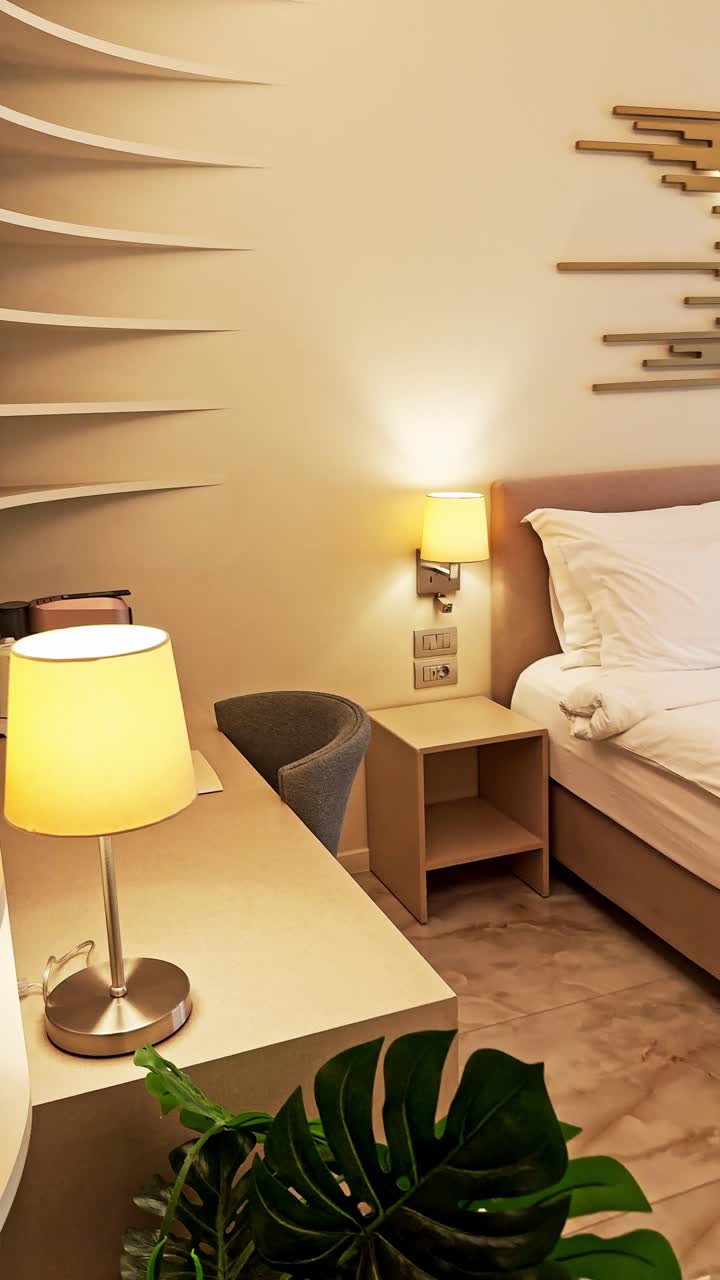 Hotel Closet with White Bathrobe and Slippers