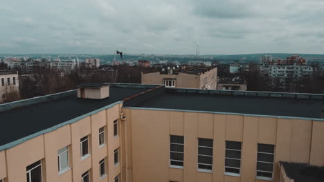 flying over the roofs in the city of chisináu, moldova