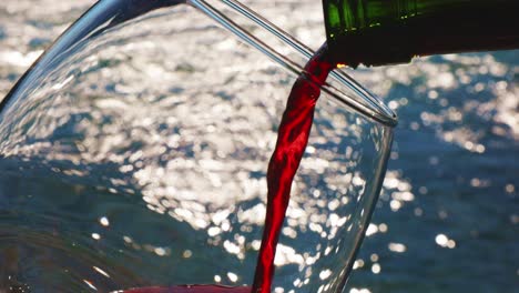 pouring red wine outdoors