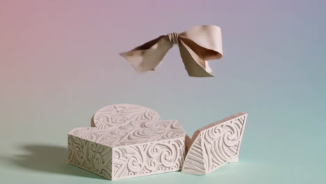 elegant heart gift box with floating bow on gradient background