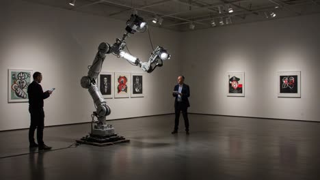 a unique interaction between man and machine: exploring the intersection of art and technology in a contemporary gallery setting