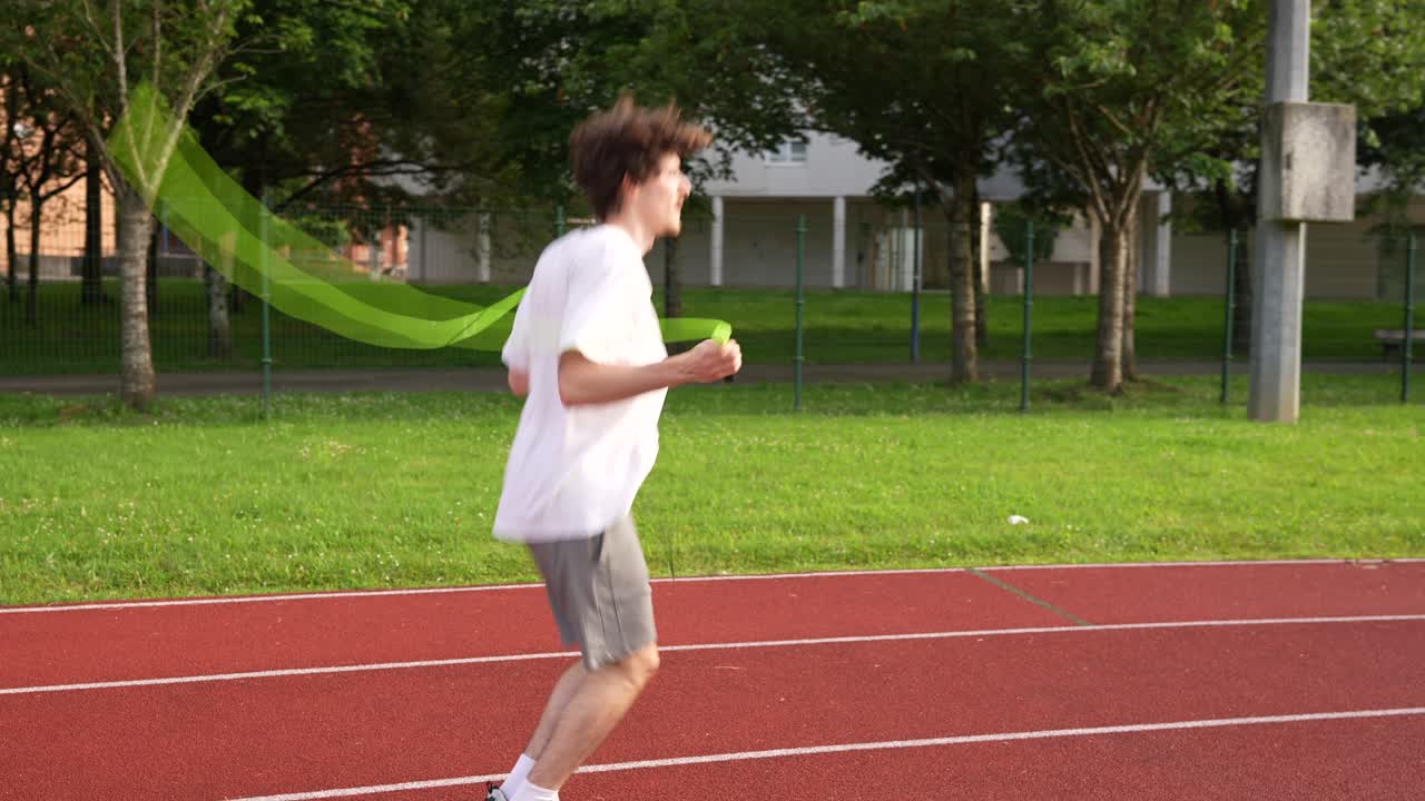 Man jumping rope on a track
