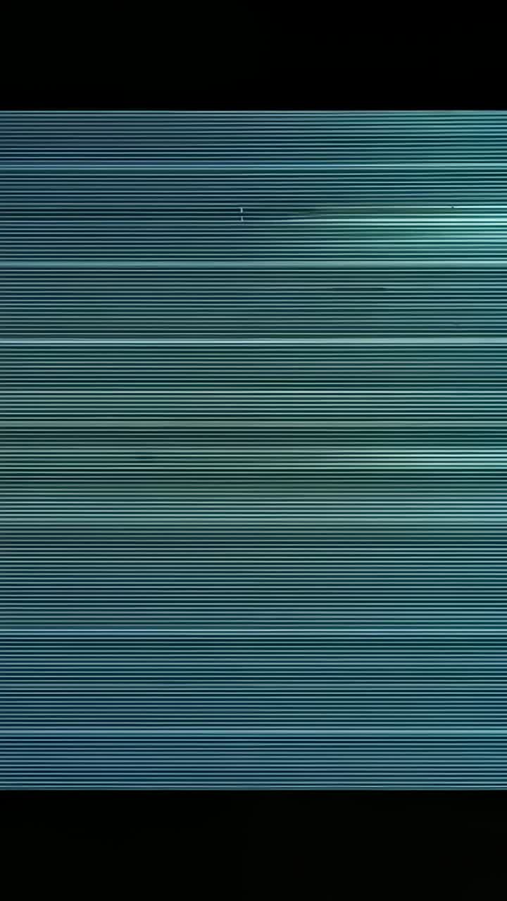 Vertical video: Reacting to light shift, blue lines moving on closeup screen, dark band, black bars