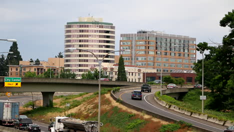 Vehicles-traveling-curved-on-ramp-to-an-interstate-in-Washington-state