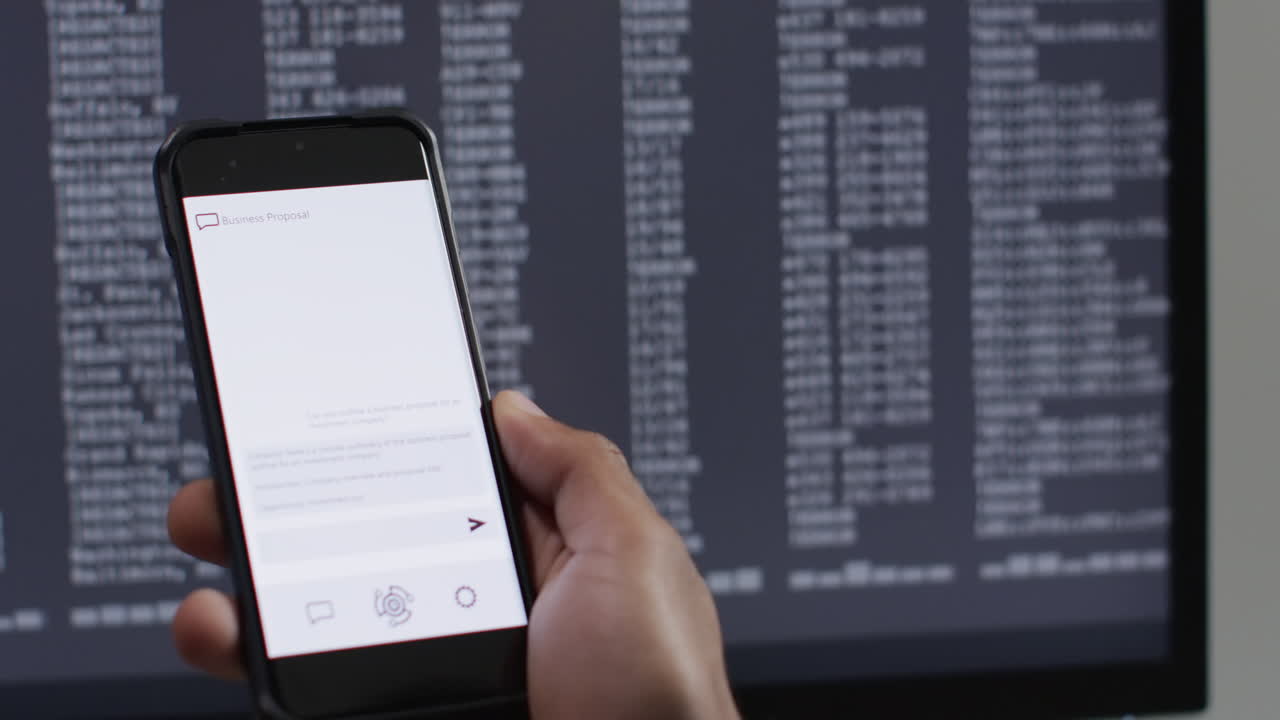 Video of biracial businessman using smartphone and data processing on screen in background