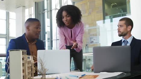 Young-business-people-talking-in-a-modern-office