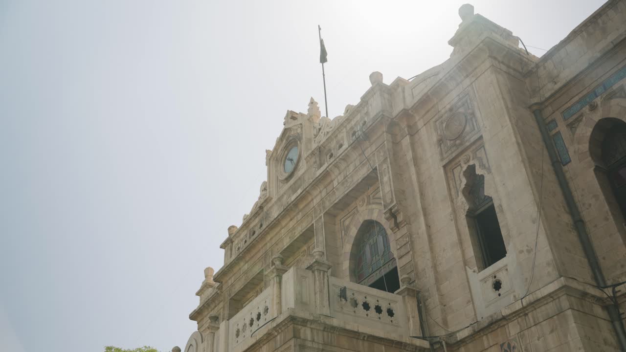 Cinematic close-up of Hejaz Station exterior in Damascus, highlighting historic architectural details, perfect for documentaries, news, and cultural features