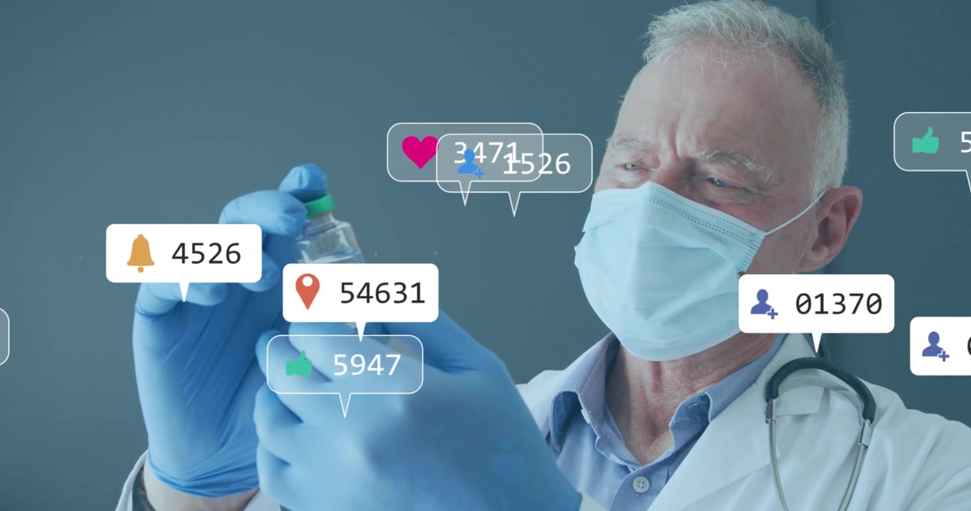 Médico sênior inclinando frasco e examinando fluido, causando a multiplicação de ícones sociais nas luvas.