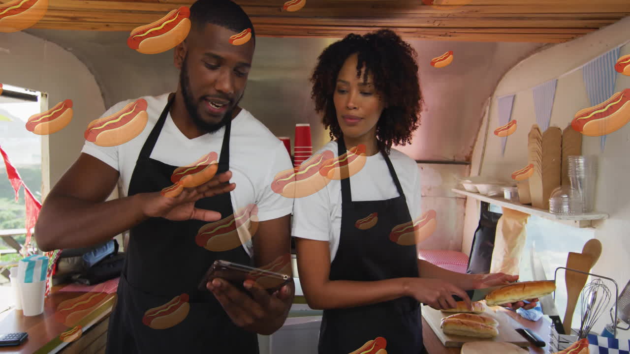 Animation de hot-dog sur deux personnes préparant de la nourriture dans une cuisine