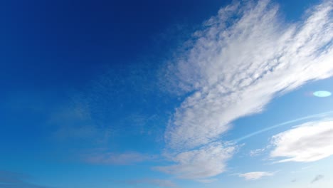 soothing blue sky background with cirrus clouds moving slowly