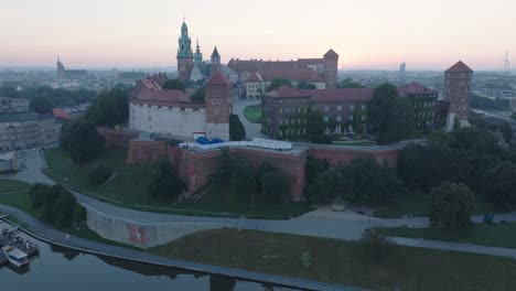 aerial drone shot of krakow poland wawel castle old town with the river vistula at sunrise