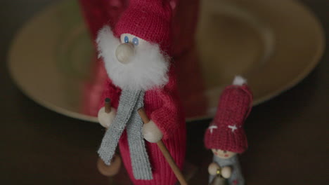 close up tilt up of two swedish gnomes