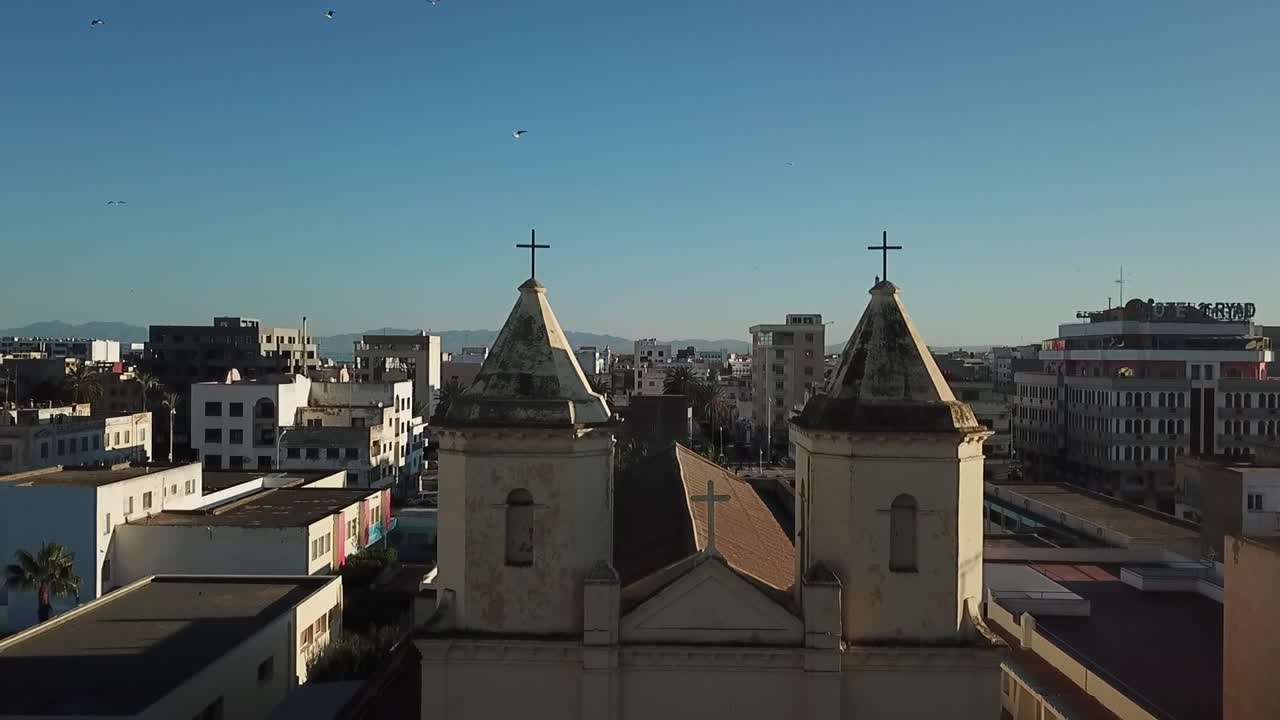 Drone-style footage of an old historic church in Al Hoceima, showcasing its aged architecture and cultural heritage in northern Morocco