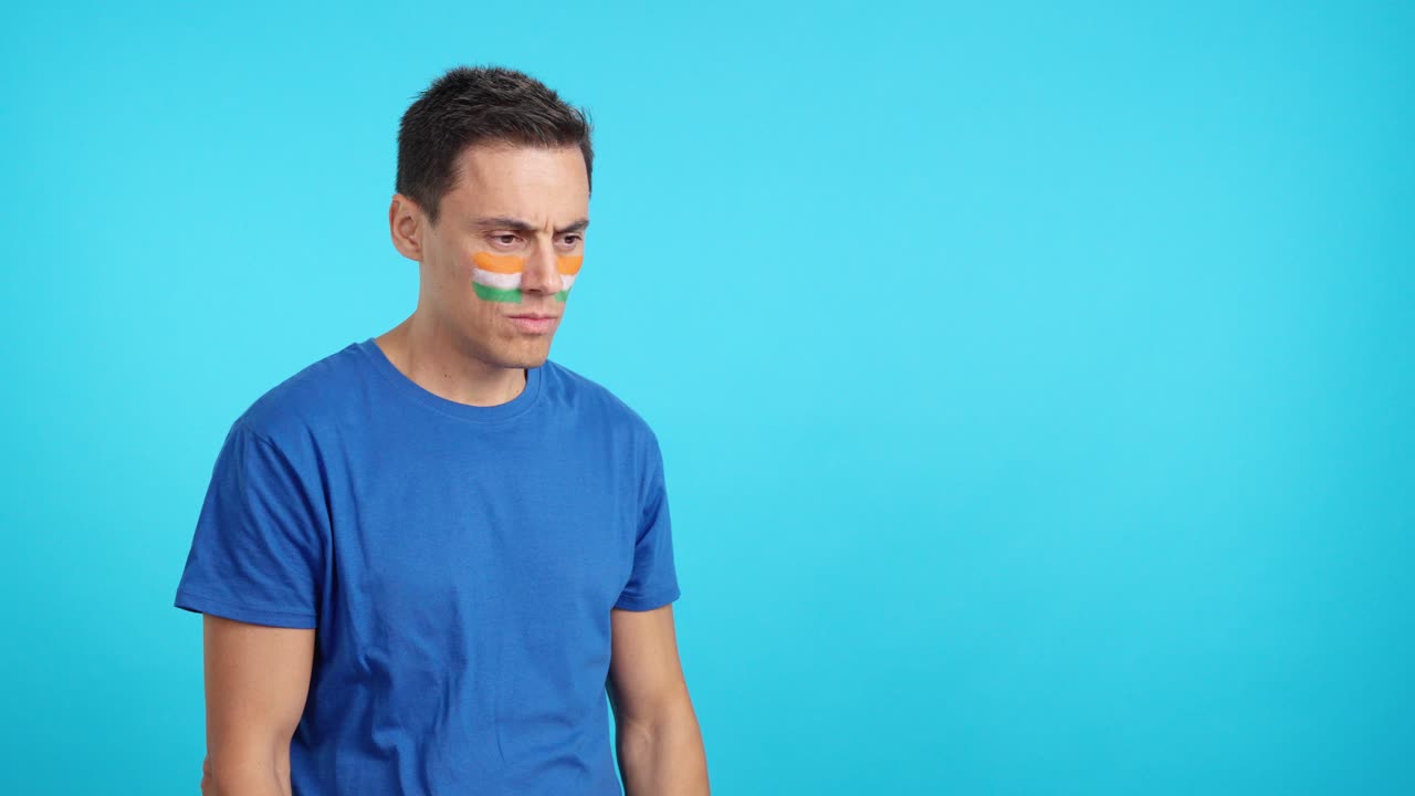 Indian patriot man looking away with serious expression