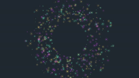 vibrantly colored spiral of dots on dark background
