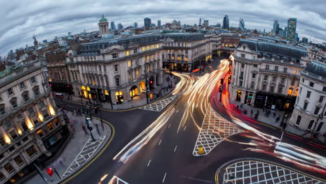 nighttime view of london street with busy traffic