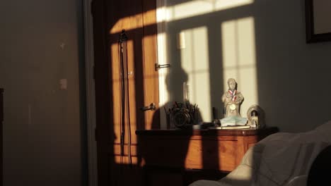 silhouetted shadow shot of young man stretching hands up, waking up in sunny morning