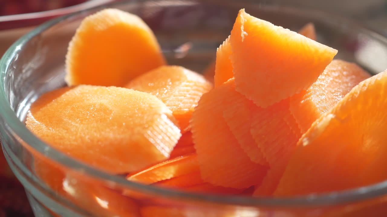 Sliced Carrots in a Glass Bowl
