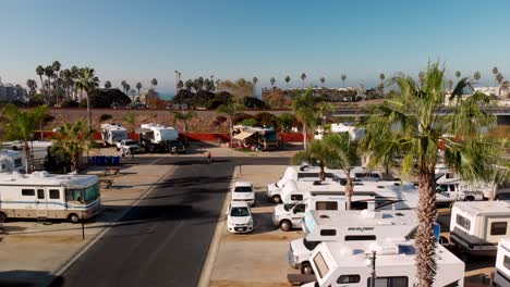 aerial crane shoot lifting up over an rv park